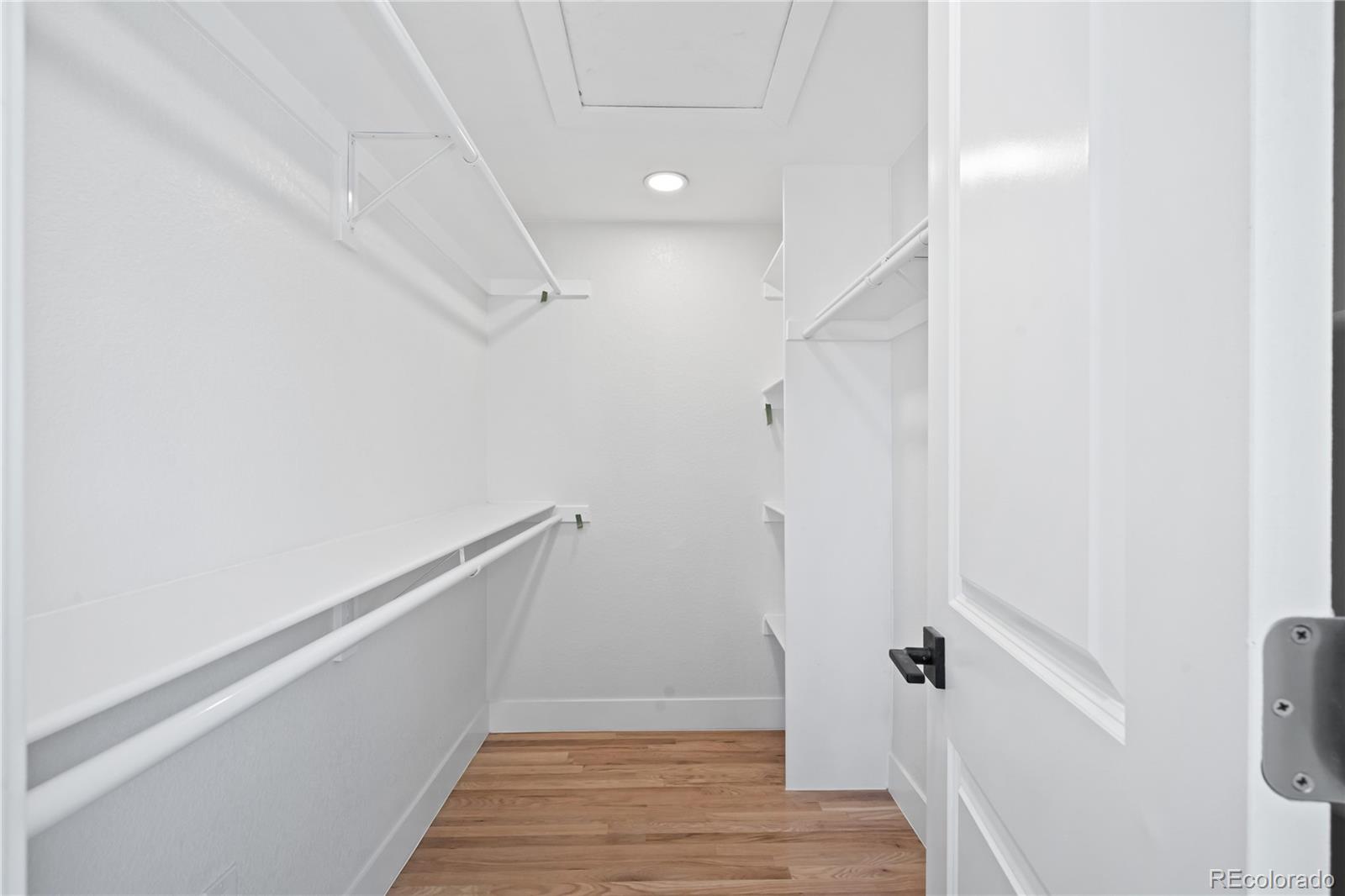 6766 Zenobia Loop Westminster, CO 80030 - Photo 32 of 50 a view of an empty walk in closet