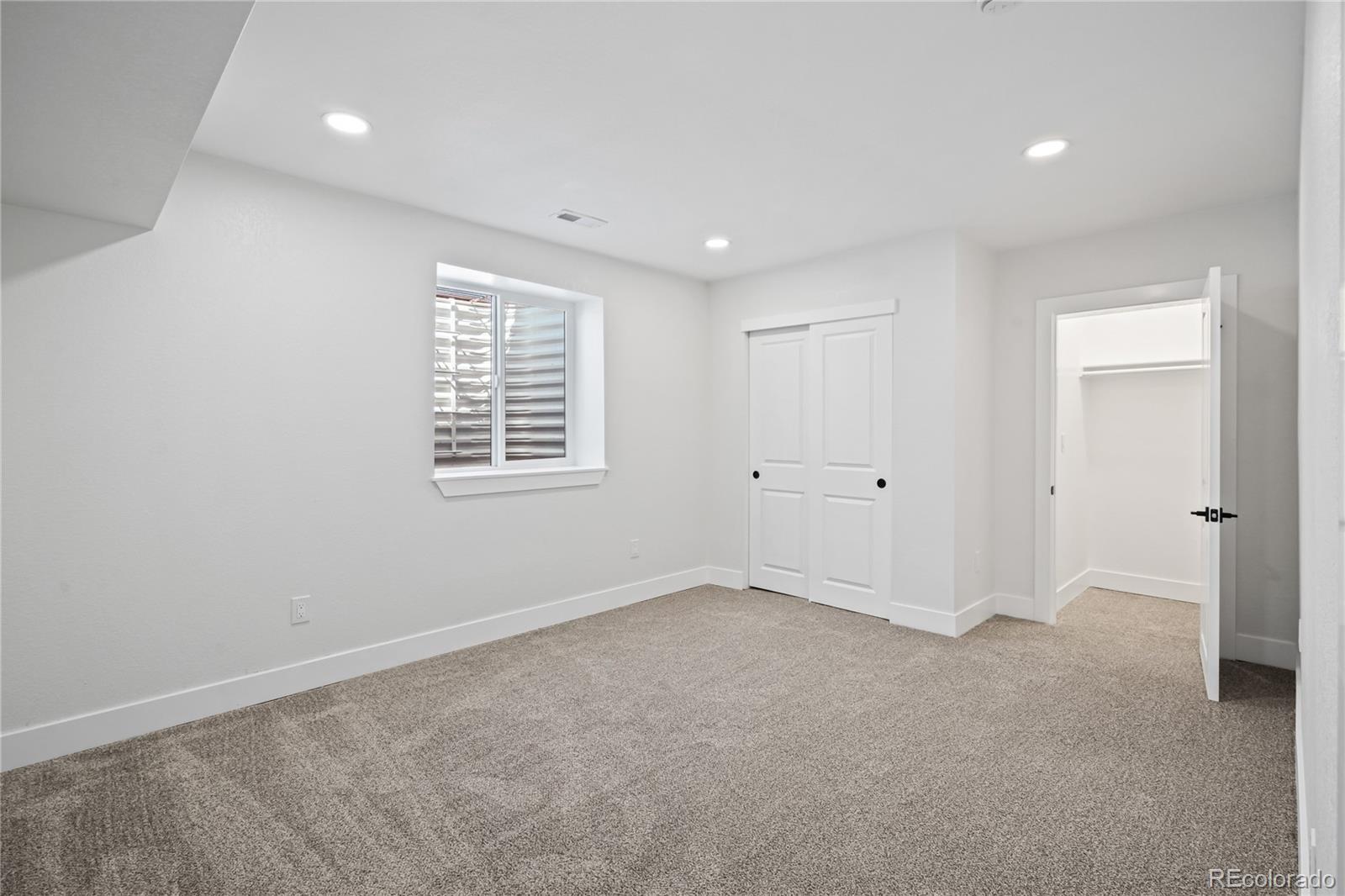 6766 Zenobia Loop Westminster, CO 80030 - Photo 45 of 50 a view of an empty room with a window