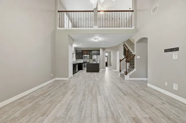 a view of livingroom with furniture and stairs