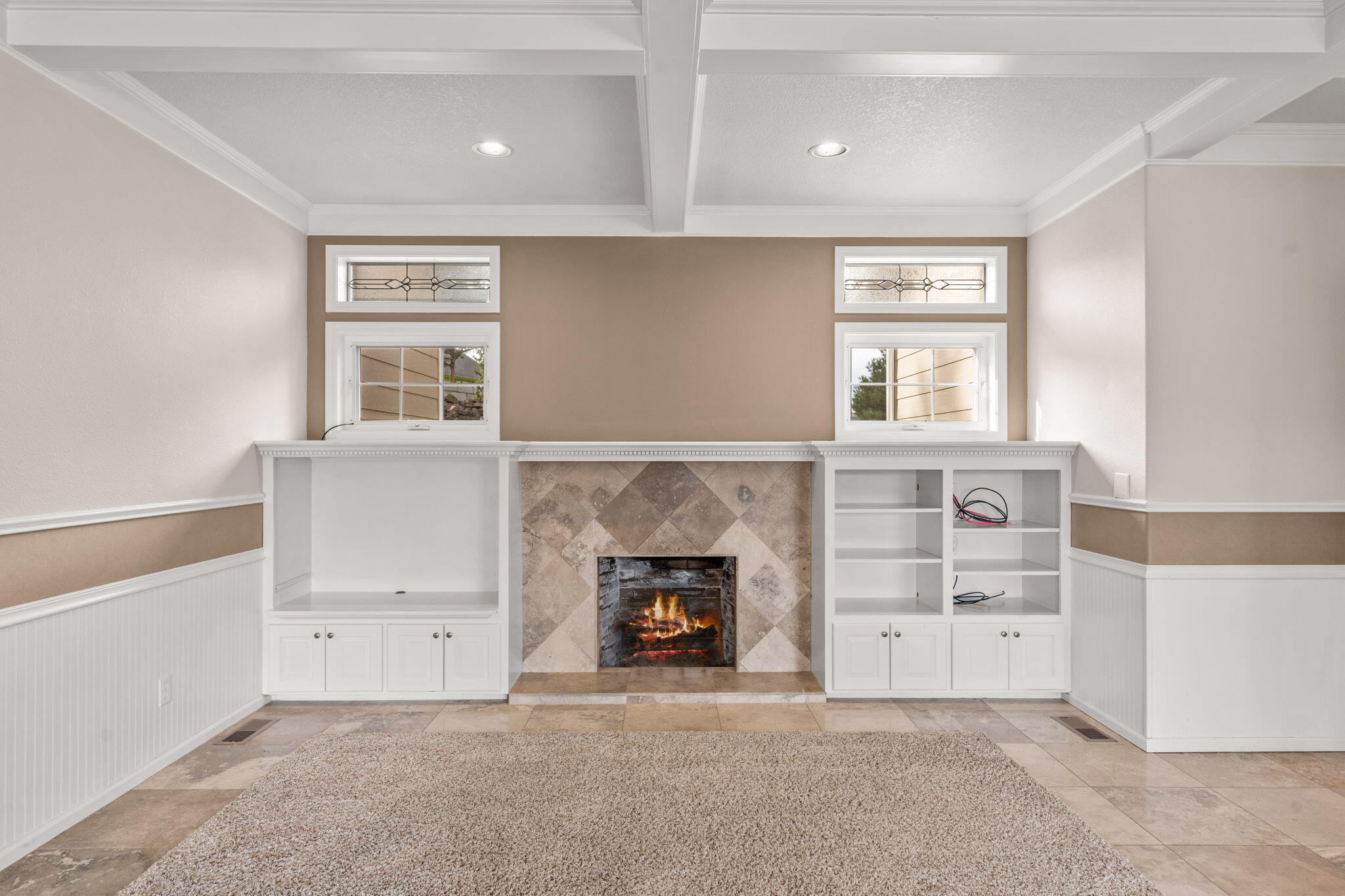 61504 Southeast Hill Ridge Road Bend, OR 97702 - Photo 28 of 70 a living room with furniture and a fireplace