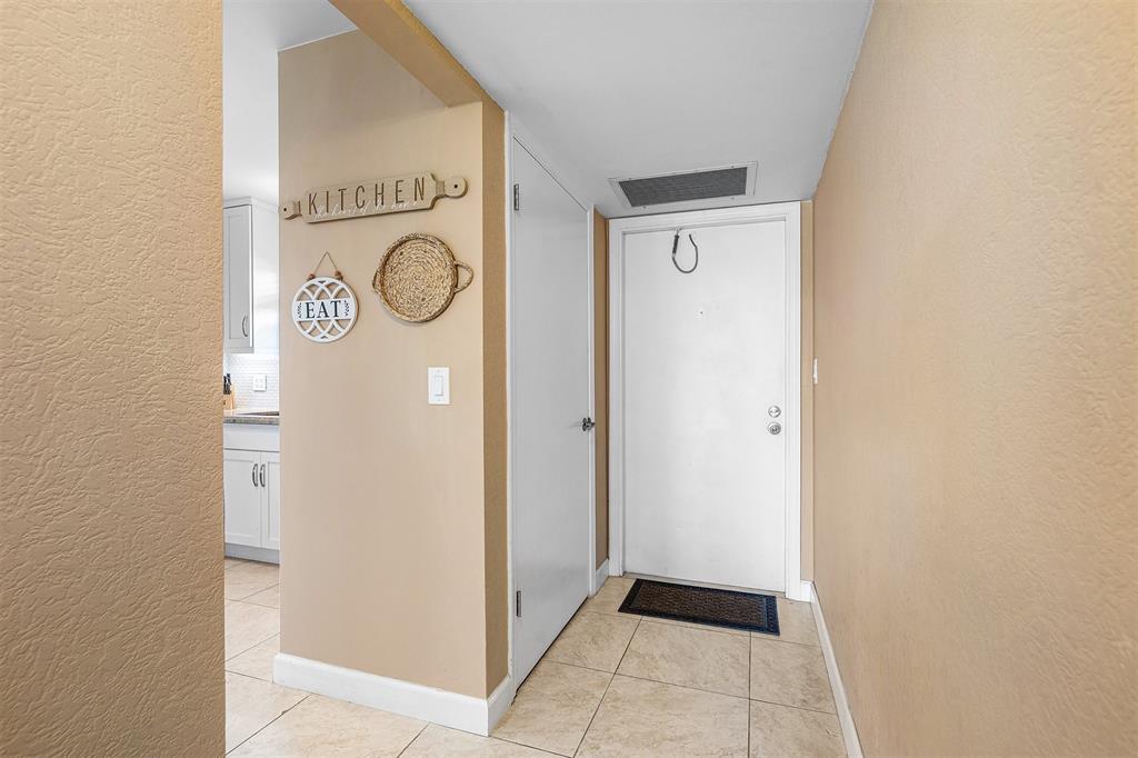 2440 DC Country Club Boulevard, Unit 111C Deerfield Beach, FL 33442 - Photo 2 of 43 a view of washer and dryer