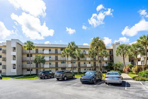 a cars parked in front of a building