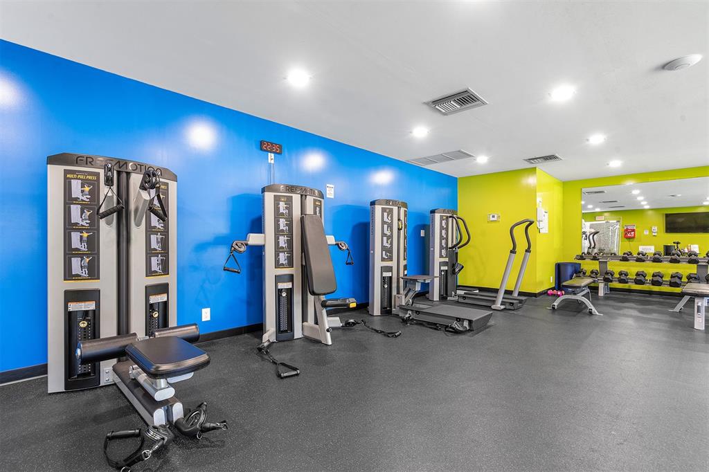 2440 DC Country Club Boulevard, Unit 111C Deerfield Beach, FL 33442 - Photo 35 of 43 a view of a room with gym equipment