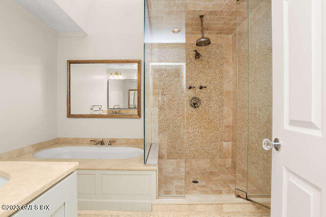 28 Home Place, Unit B1 Greenwich, CT 06830 - Photo 14 of 22 a bathroom with a granite countertop sink mirror and shower