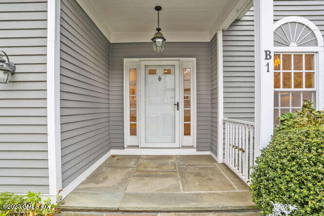 28 Home Place, Unit B1 Greenwich, CT 06830 - Photo 2 of 22 a view of porch with a door and a window