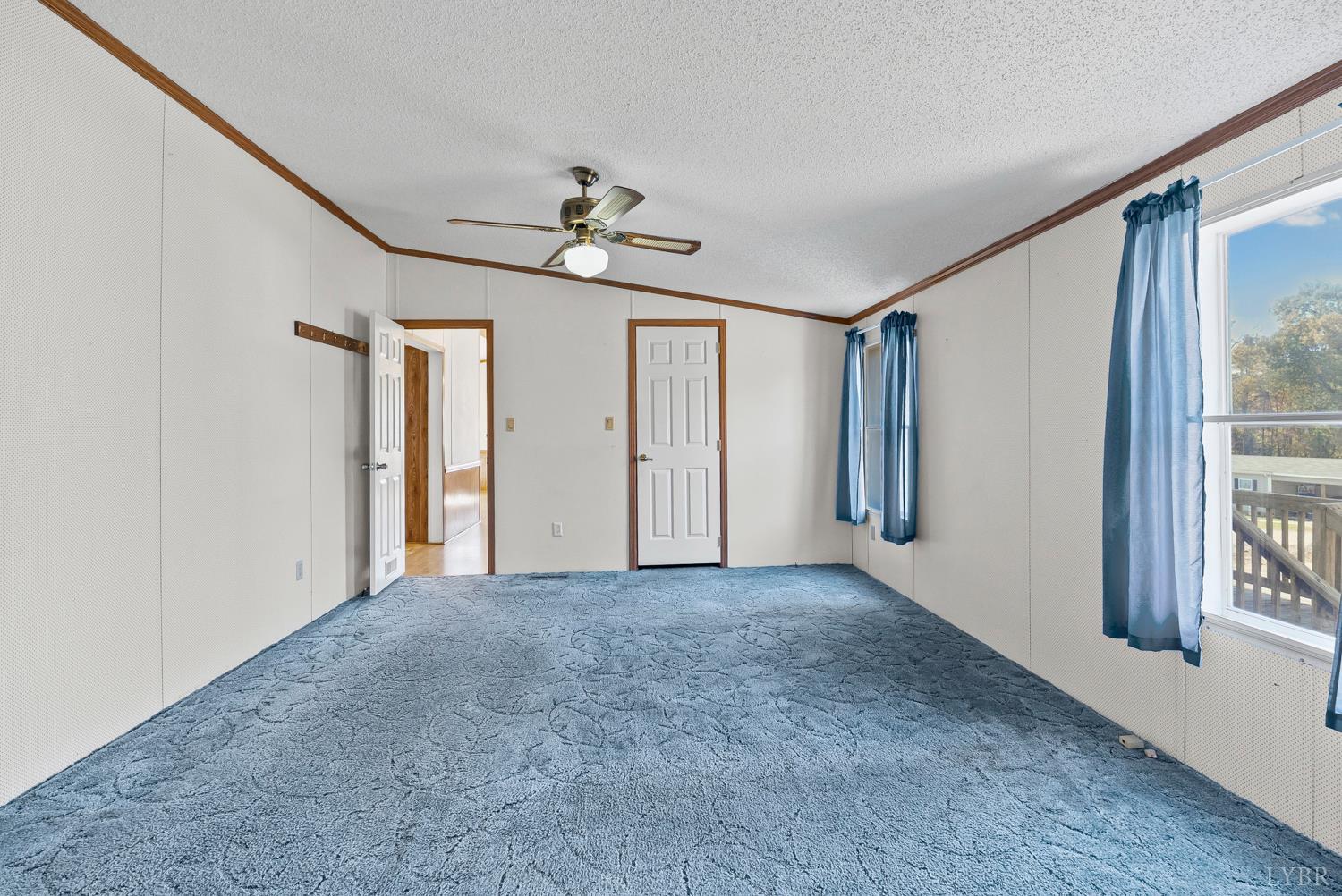 1821 Telegraph Road Gretna, VA 24557 - Photo 21 of 54 a view of empty room with windows