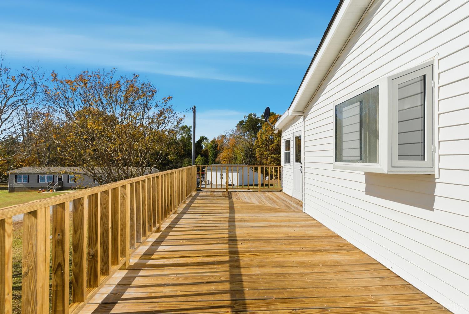 1821 Telegraph Road Gretna, VA 24557 - Photo 31 of 54 a view of a balcony with wooden floor and fence