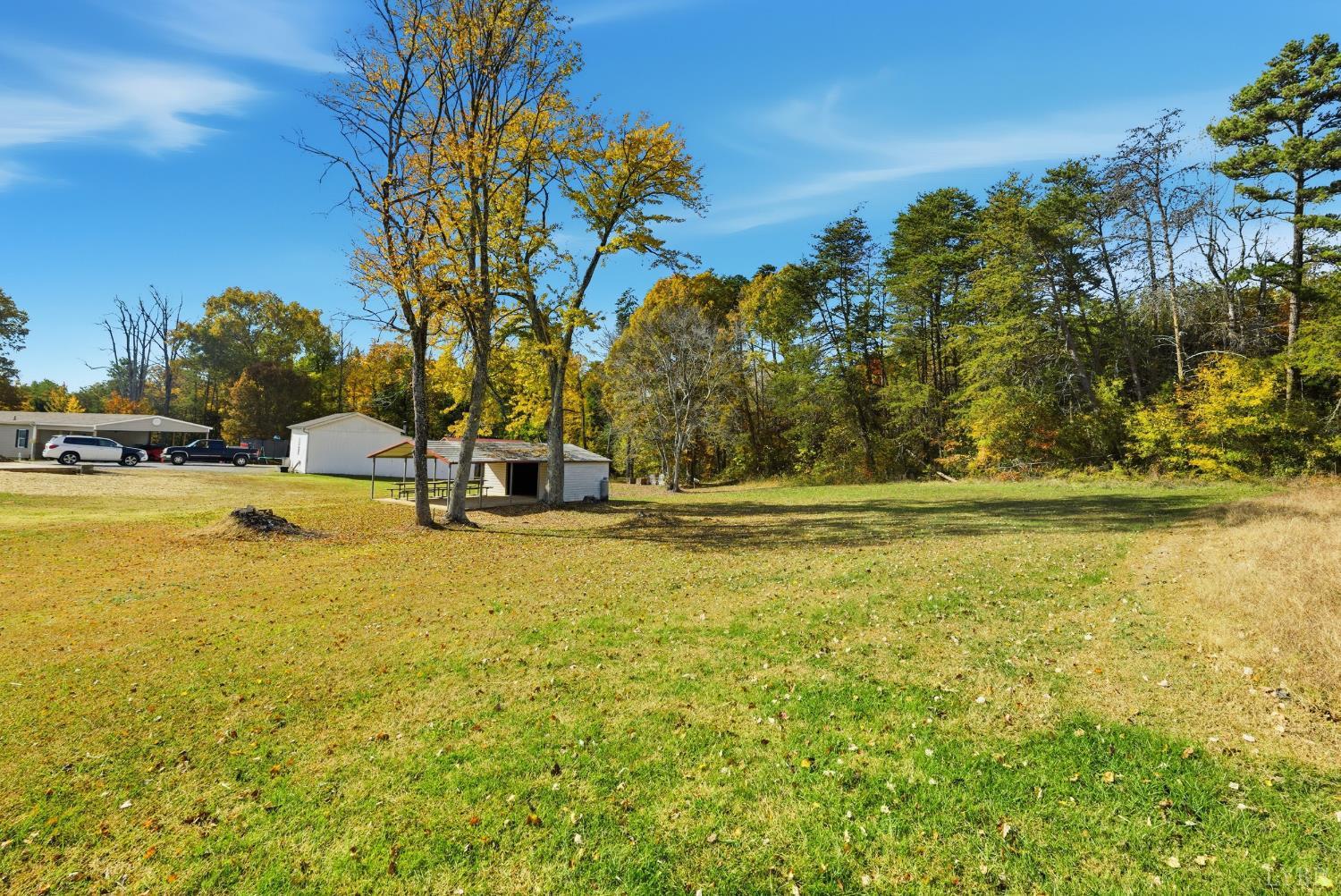 1821 Telegraph Road Gretna, VA 24557 - Photo 37 of 54 a view of a swimming pool with an outdoor space and seating area