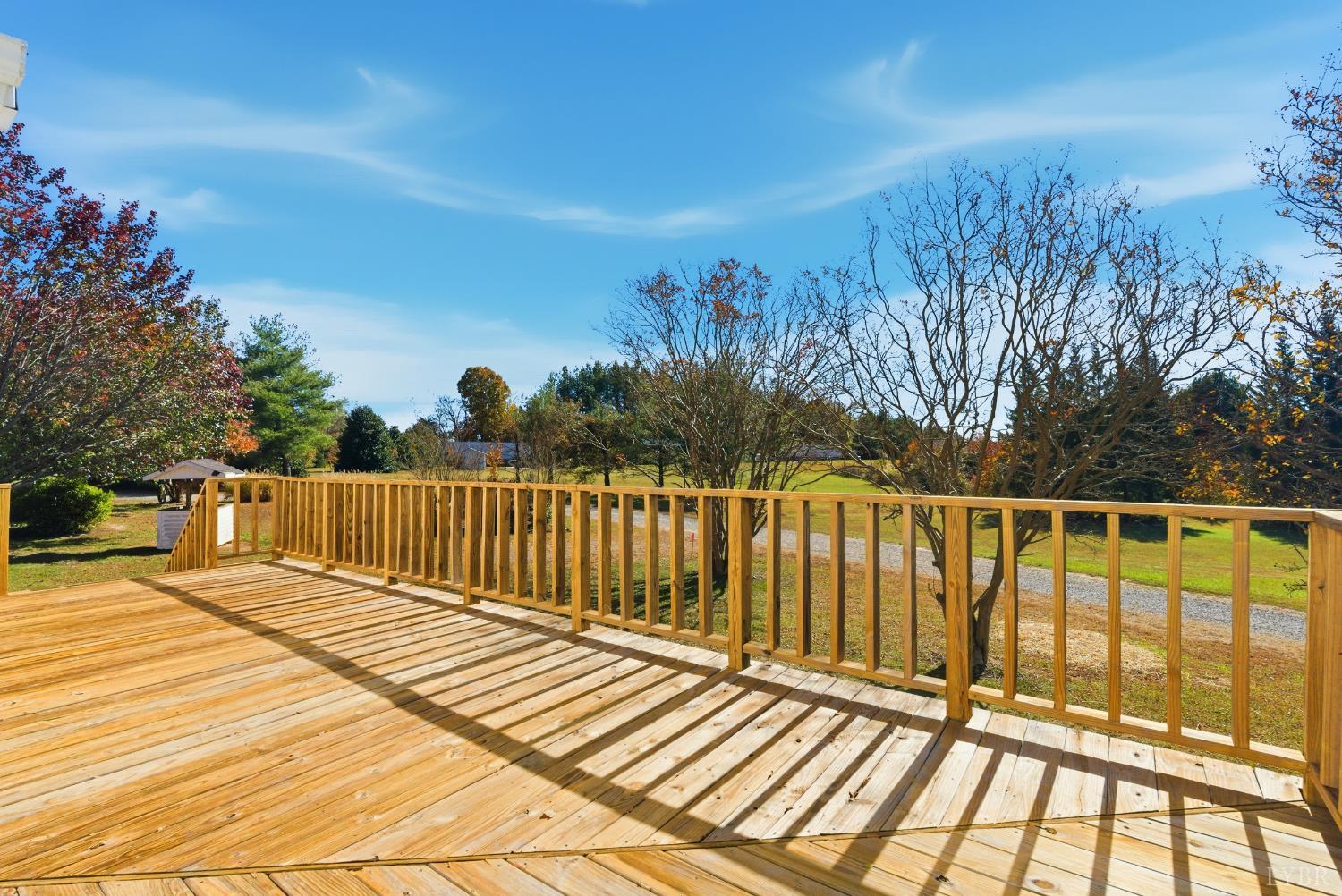 1821 Telegraph Road Gretna, VA 24557 - Photo 46 of 54 a view of balcony with wooden floor and fence
