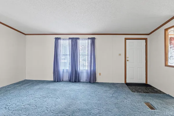 a view of an empty room with window