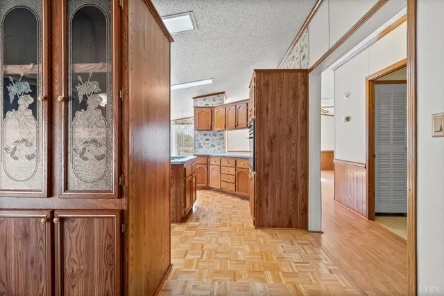 a kitchen with stainless steel appliances granite countertop a stove sink and cabinets