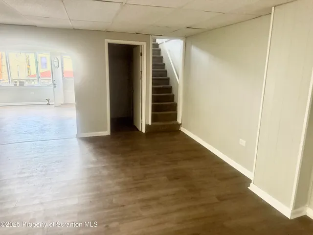 an entryway of a room with stairs