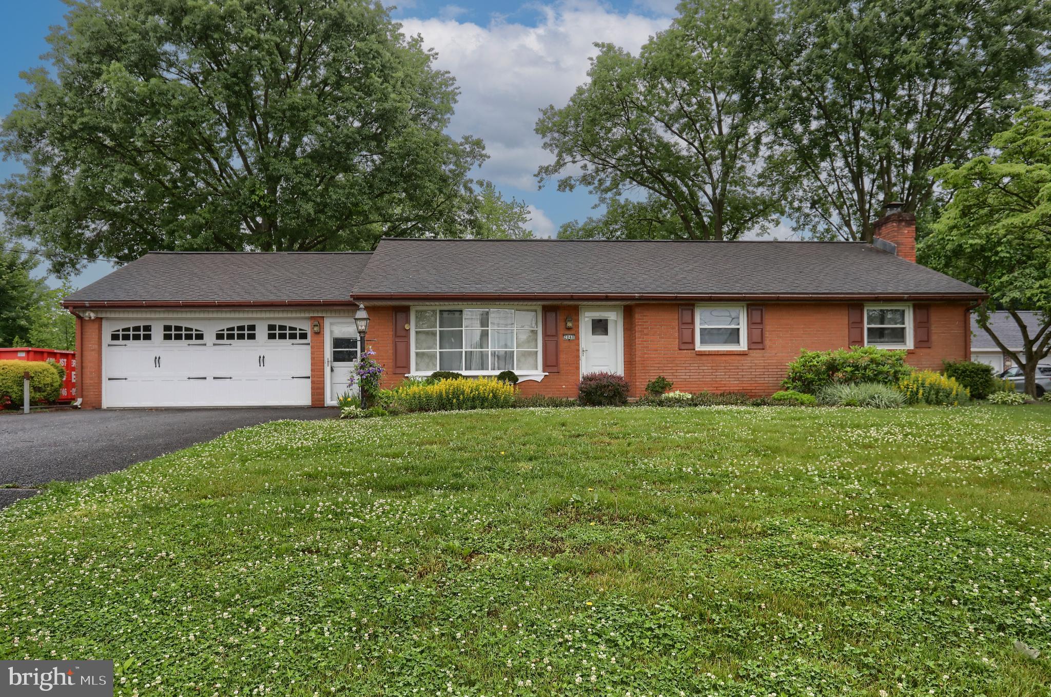 2040 Miller Road East Petersburg, PA 17520 - Photo 24 of 49 a view of a yard in front of a house with plants and large tree