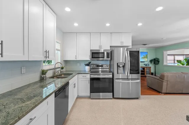 a bed room with a bed and a window