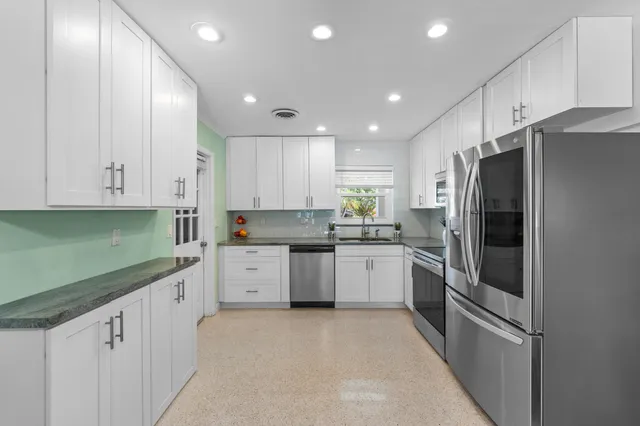 a room with a cabinet and mirror