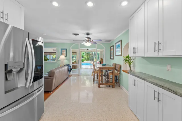 a bathroom with a bathtub a toilet and a shower