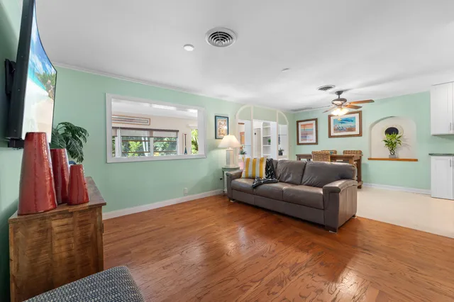 a bedroom with furniture and a window