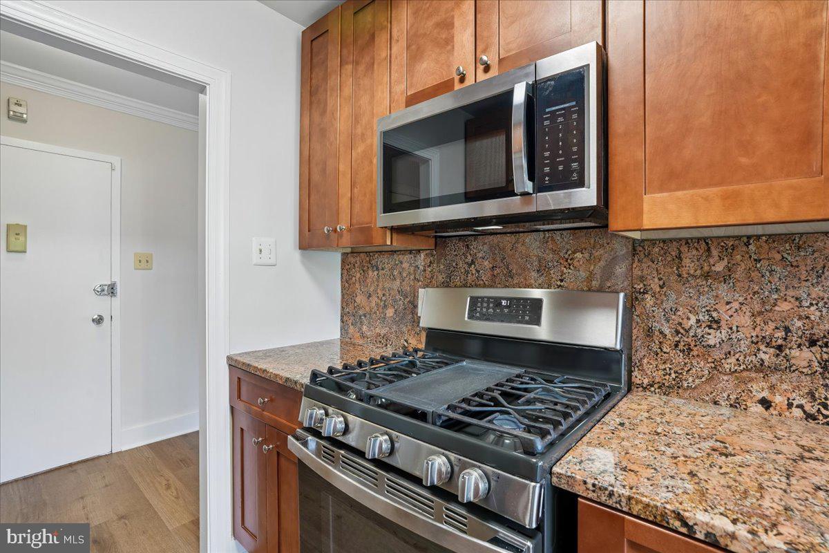 4000 Tunlaw Road Northwest, Unit 1003 Washington, DC 20007 - Photo 10 of 25 Modern kitchen with sleek finishes.