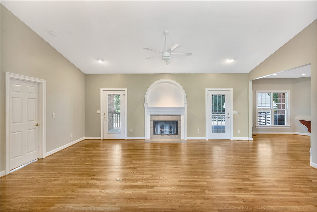 3620 Centerville Road Anderson, SC 29625 - Photo 20 of 49 Polished hardwood floors and a central fireplace define this inviting living space.
