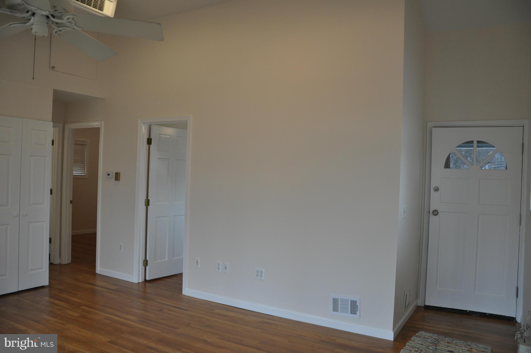 10303 Procter Street Silver Spring, MD 20901 - Photo 8 of 24 a view of a livingroom with wooden floor
