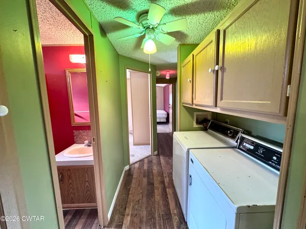 a bathroom with a sink a mirror and a shower