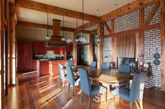 a bed room with a bed and a large window