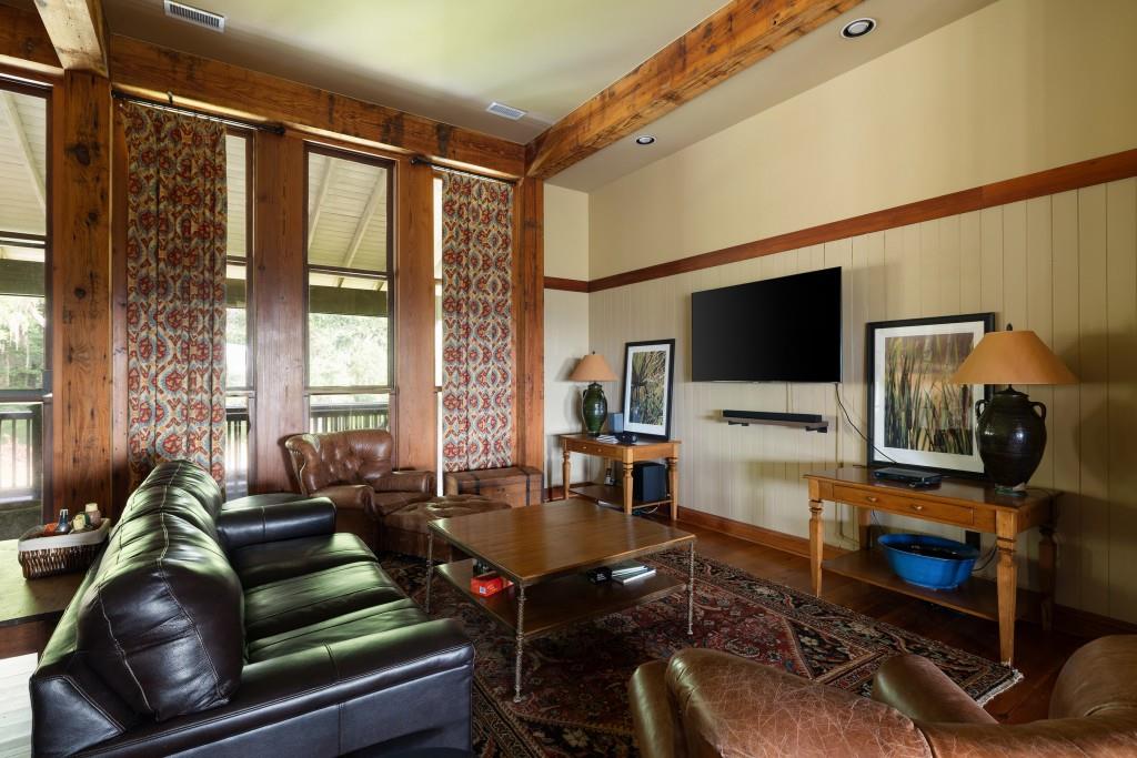 1300 Retreat Road Riceboro, GA 31323 - Photo 20 of 91 a living room with furniture and a flat screen tv