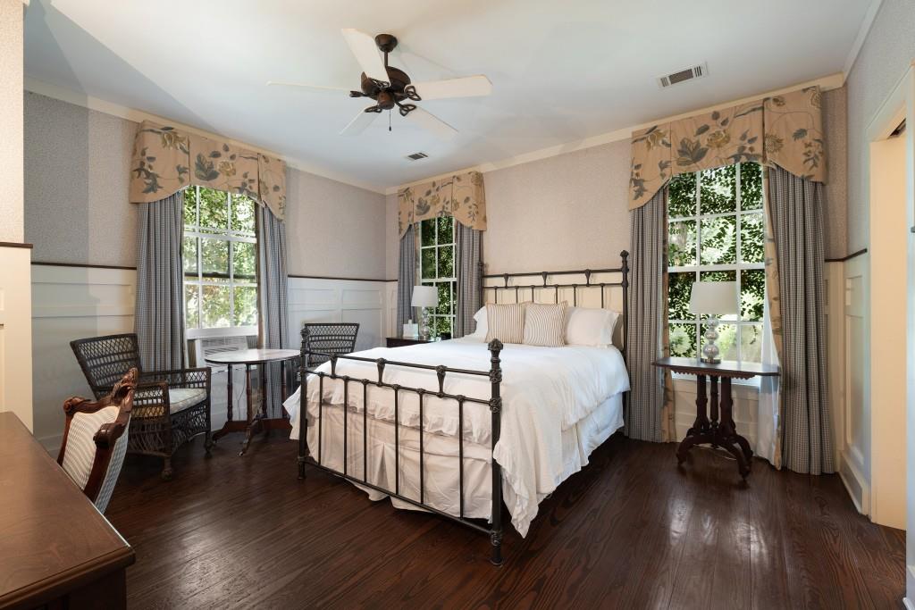 1300 Retreat Road Riceboro, GA 31323 - Photo 83 of 91 a bed room with a bed and a large window