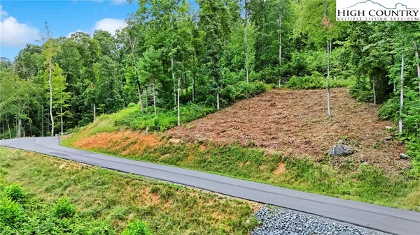 a view of a garden from a balcony
