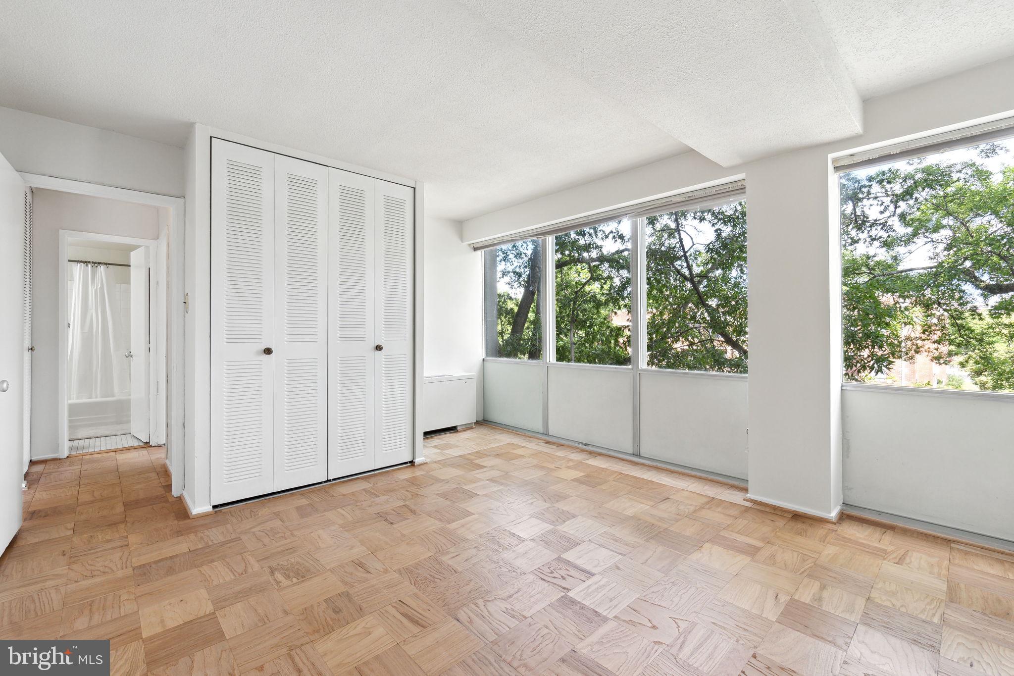 1311 Delaware Avenue Southwest, Unit S232 Washington, DC 20024 - Photo 14 of 37 Huge windows in Master bedroom