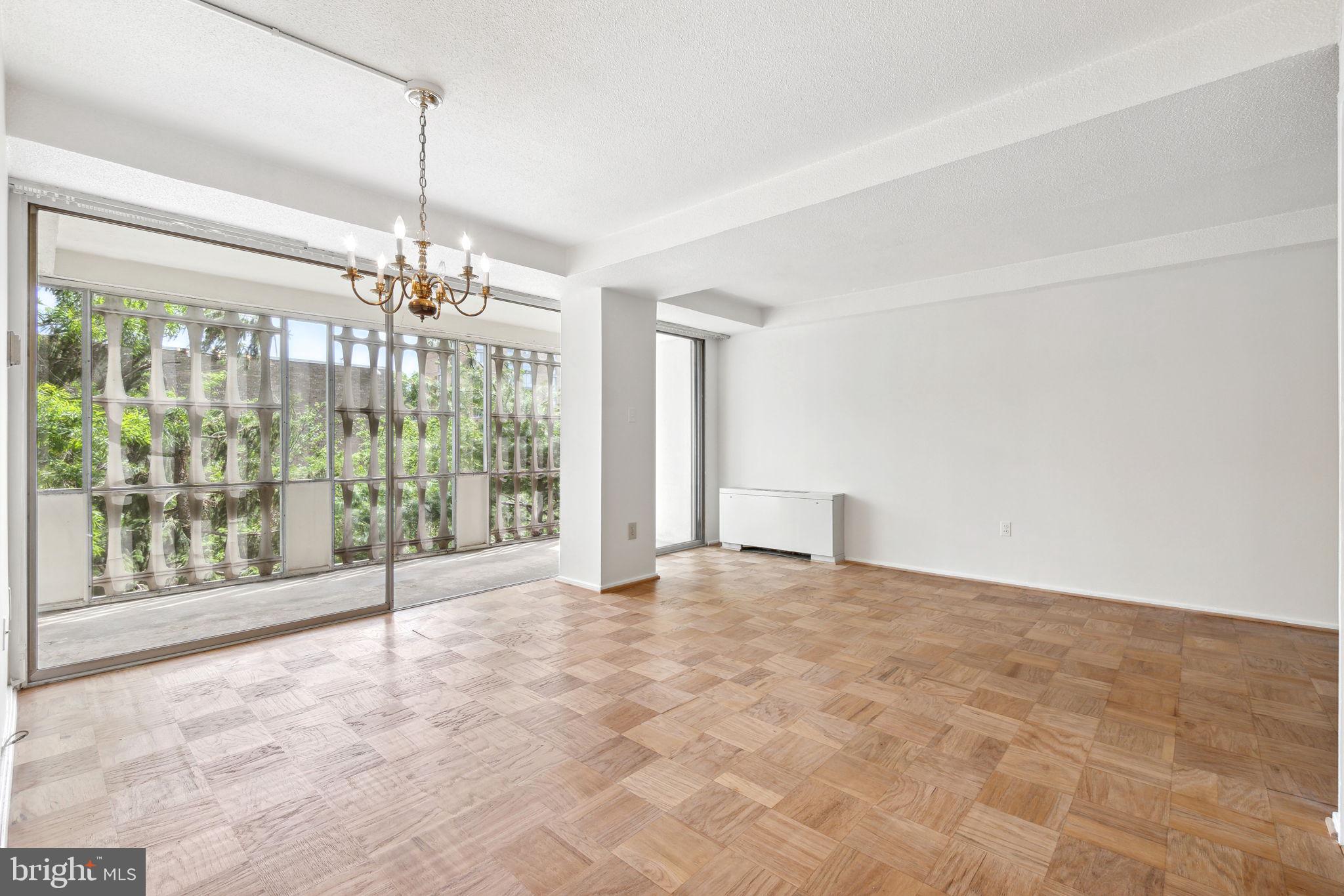 1311 Delaware Avenue Southwest, Unit S232 Washington, DC 20024 - Photo 2 of 37 Large living area with newly refinished parquet
