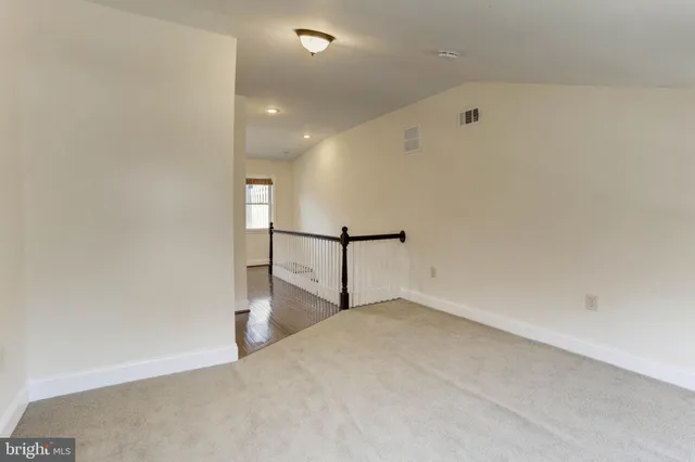a bathroom with a bathtub and a sink