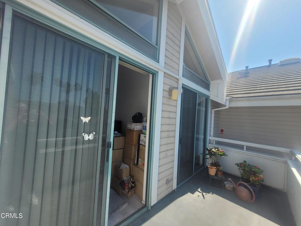865 South B Street, Unit H3 Oxnard, CA 93030 - Photo 5 of 15 a bathroom with a sink and glass door