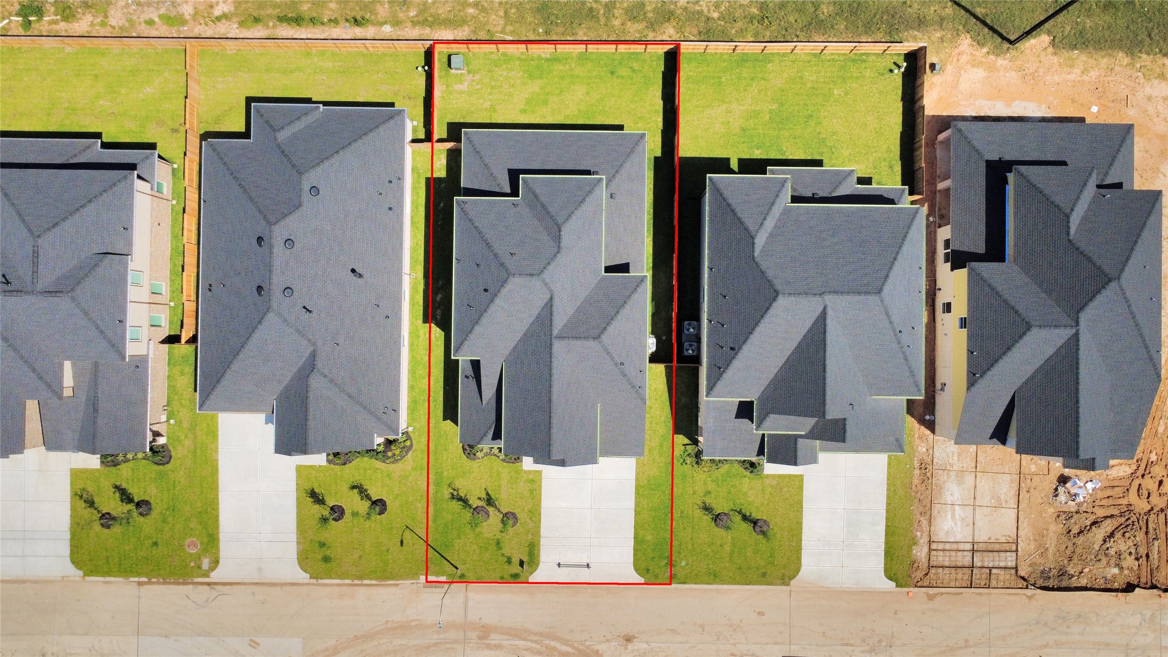 3035 Native Spg Drive Spring, TX 77373 - Photo 5 of 43 An aerial view of a spacious subdivision lot, highlighting a well-maintained yard and a fully fenced perimeter, offering both privacy and expansive outdoor space.
