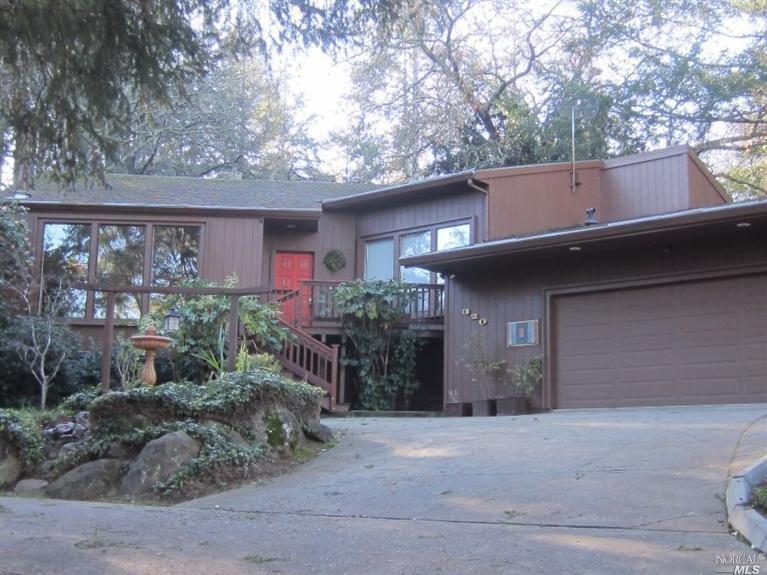 320 Gemma Circle Santa Rosa, CA 95404 - Photo 1 of 1 a view of a house with a yard and garage