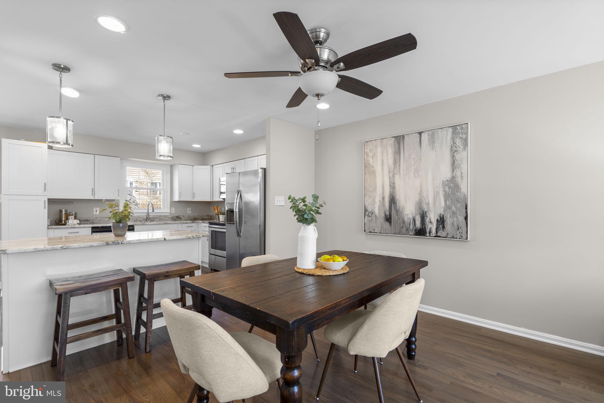 3050 Seminole Road Woodbridge, VA 22192 - Photo 5 of 35 a view of a dining room with furniture and wooden floor