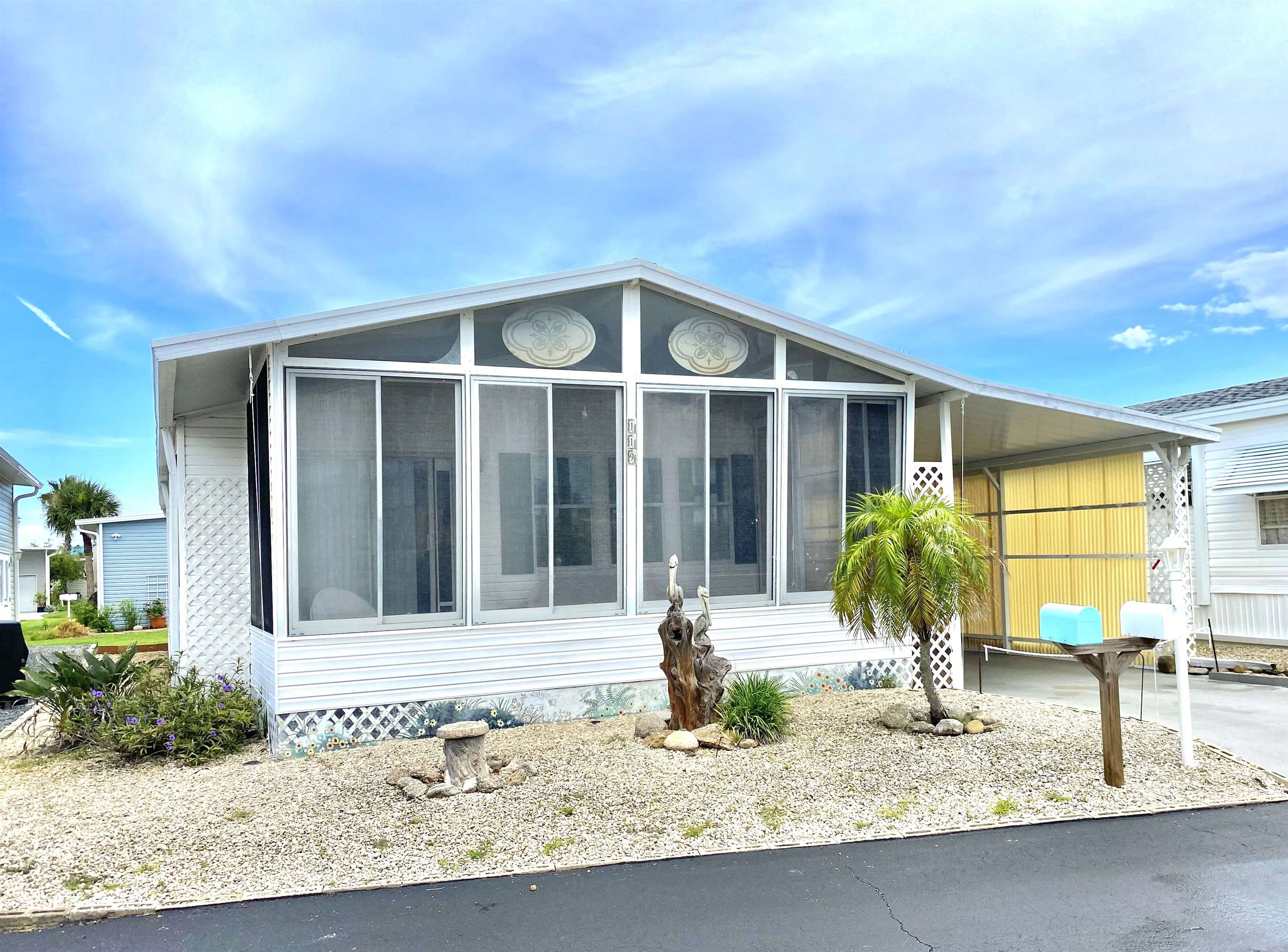119 Anchorage Drive Beverly Beach, FL 32136 - Photo 1 of 33 a front view of a house with garden