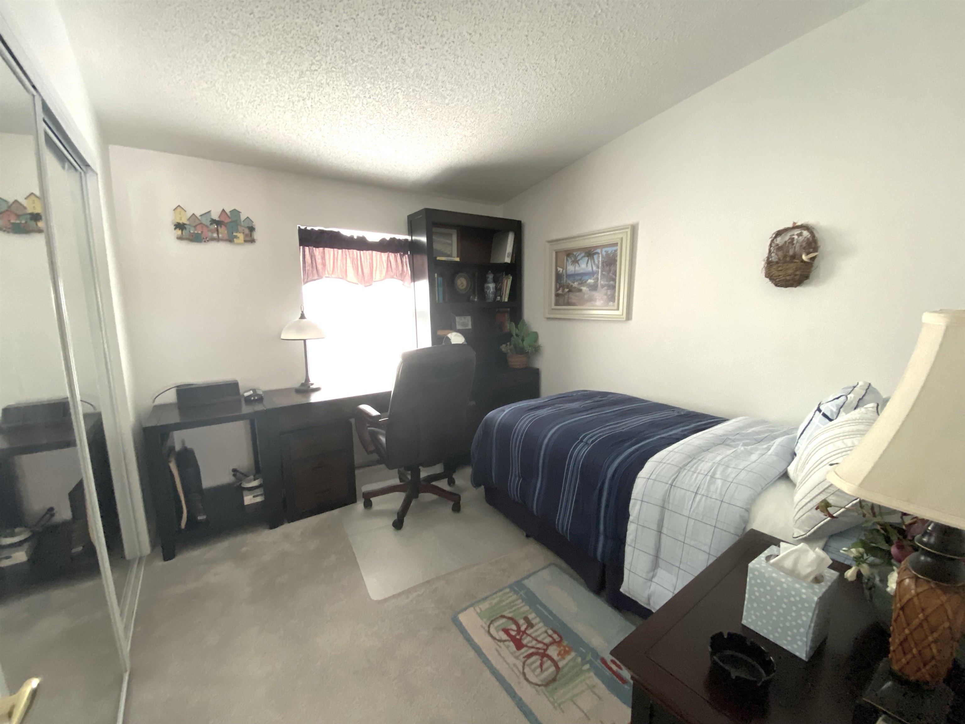 119 Anchorage Drive Beverly Beach, FL 32136 - Photo 16 of 33 a bedroom with a bed and furniture