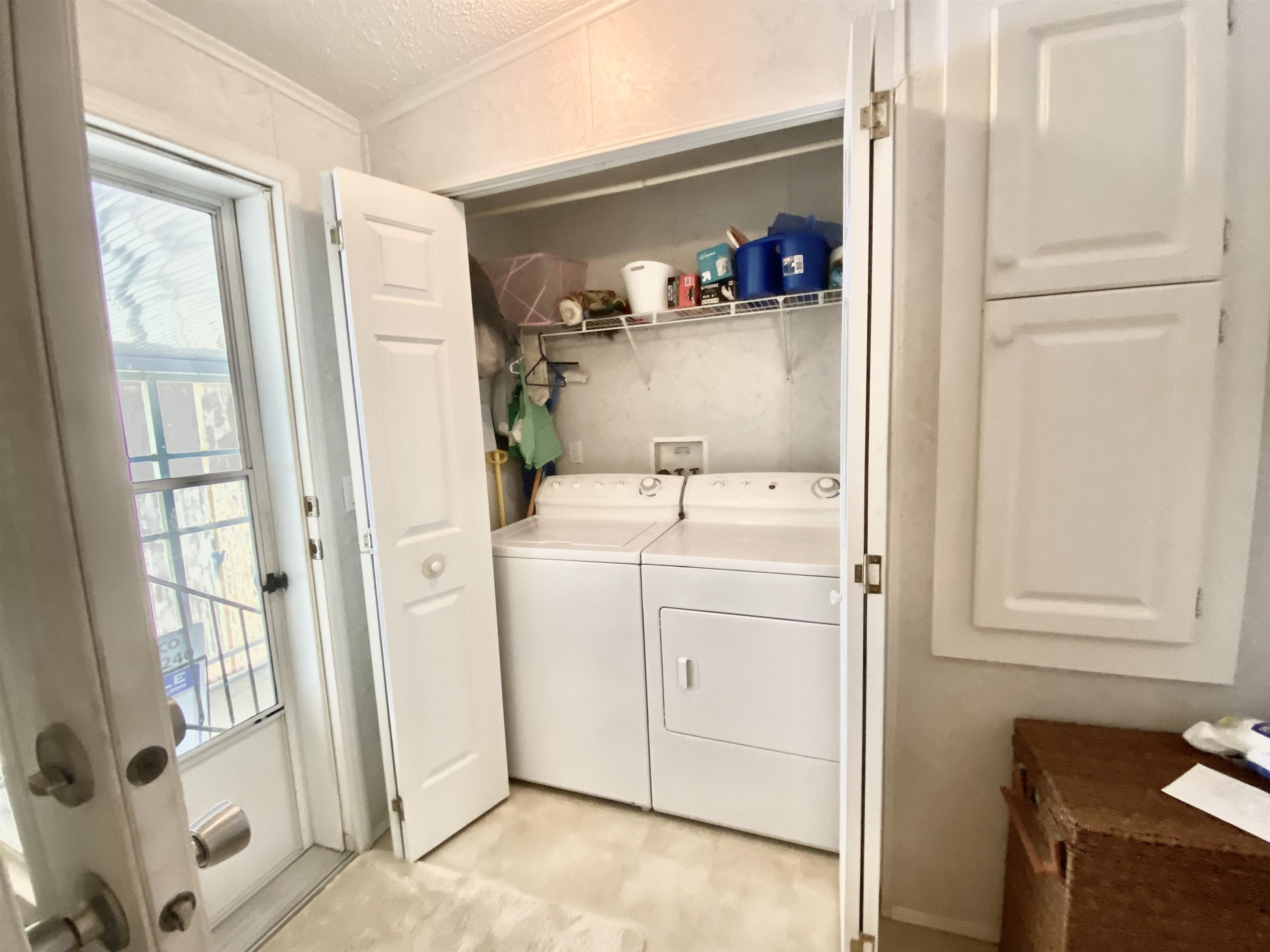 119 Anchorage Drive Beverly Beach, FL 32136 - Photo 18 of 33 a utility room with dryer and washer