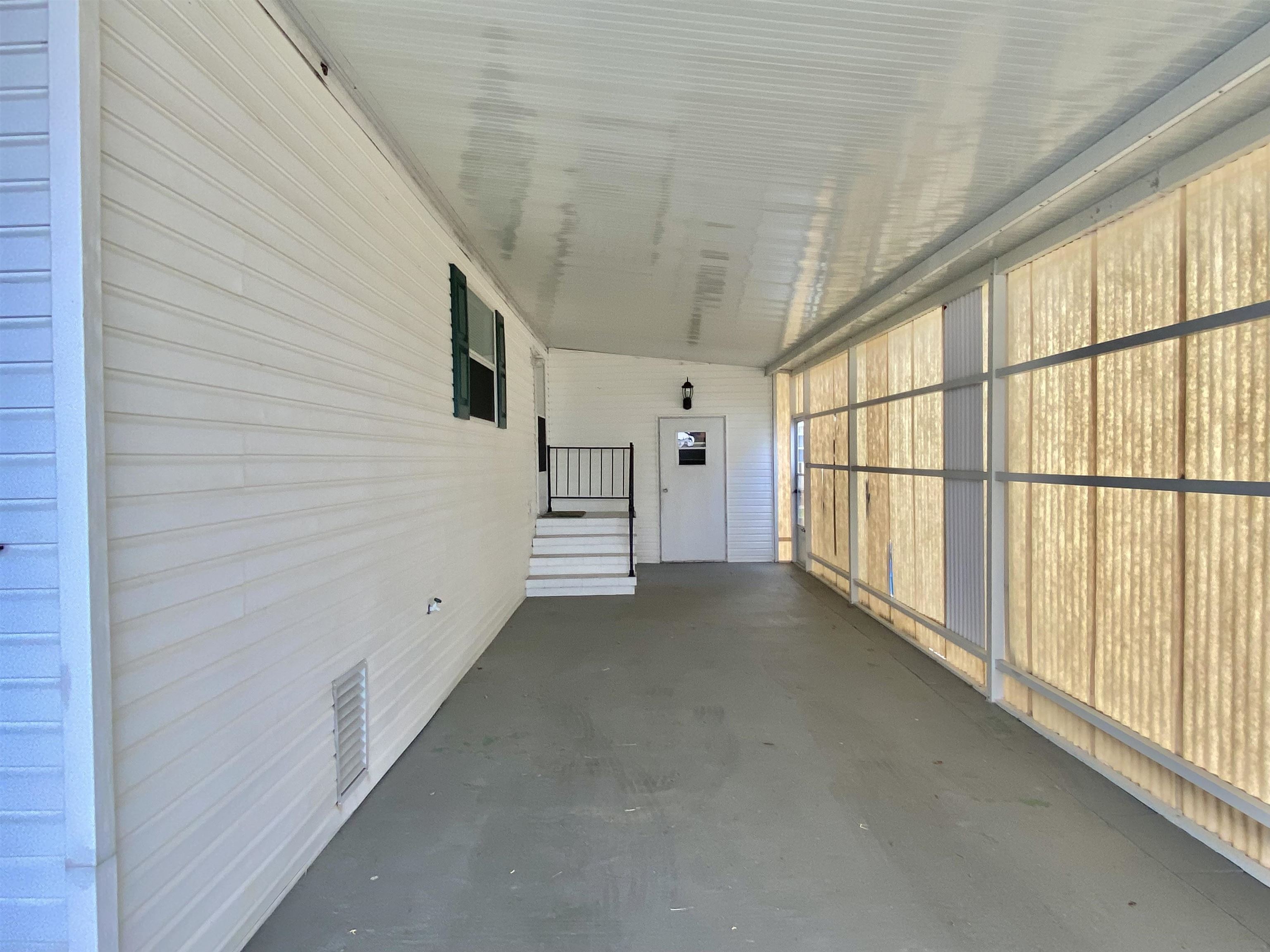 119 Anchorage Drive Beverly Beach, FL 32136 - Photo 2 of 33 a view of a livingroom with an empty space and a window