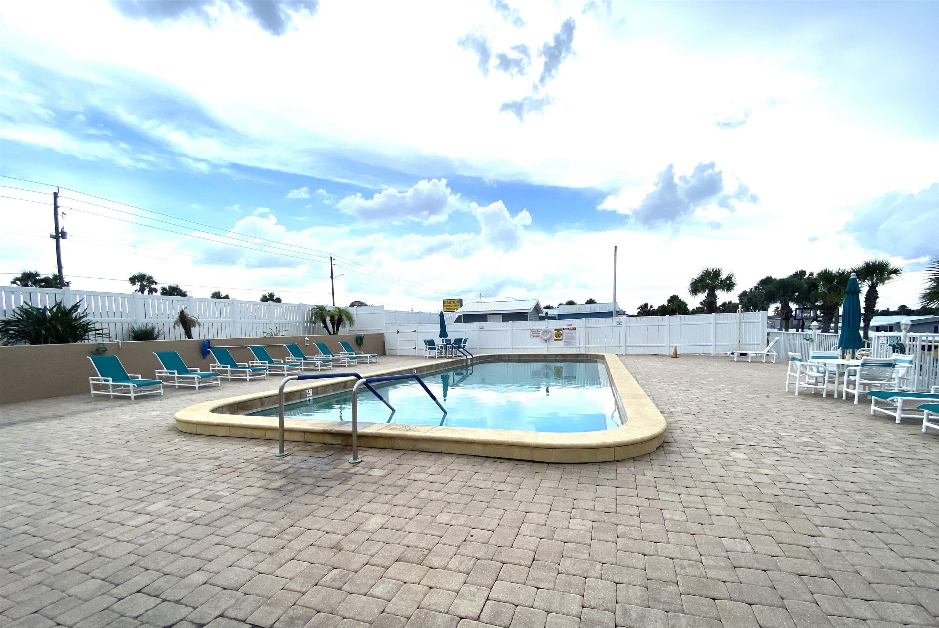 119 Anchorage Drive Beverly Beach, FL 32136 - Photo 22 of 33 a view of a swimming pool and outdoor space