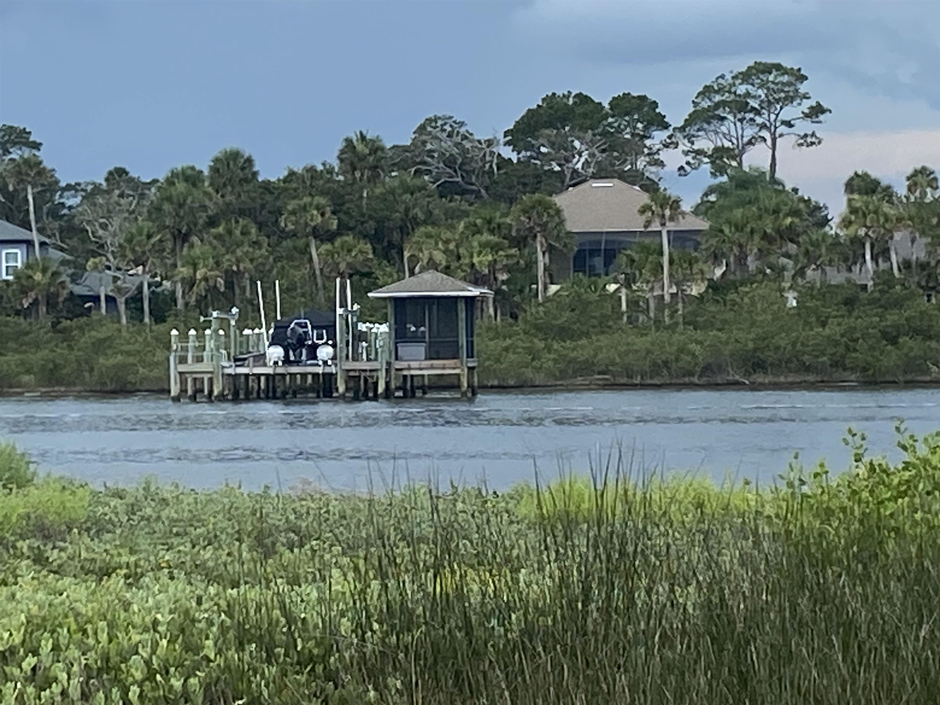 119 Anchorage Drive Beverly Beach, FL 32136 - Photo 31 of 33 a view of a house with a yard