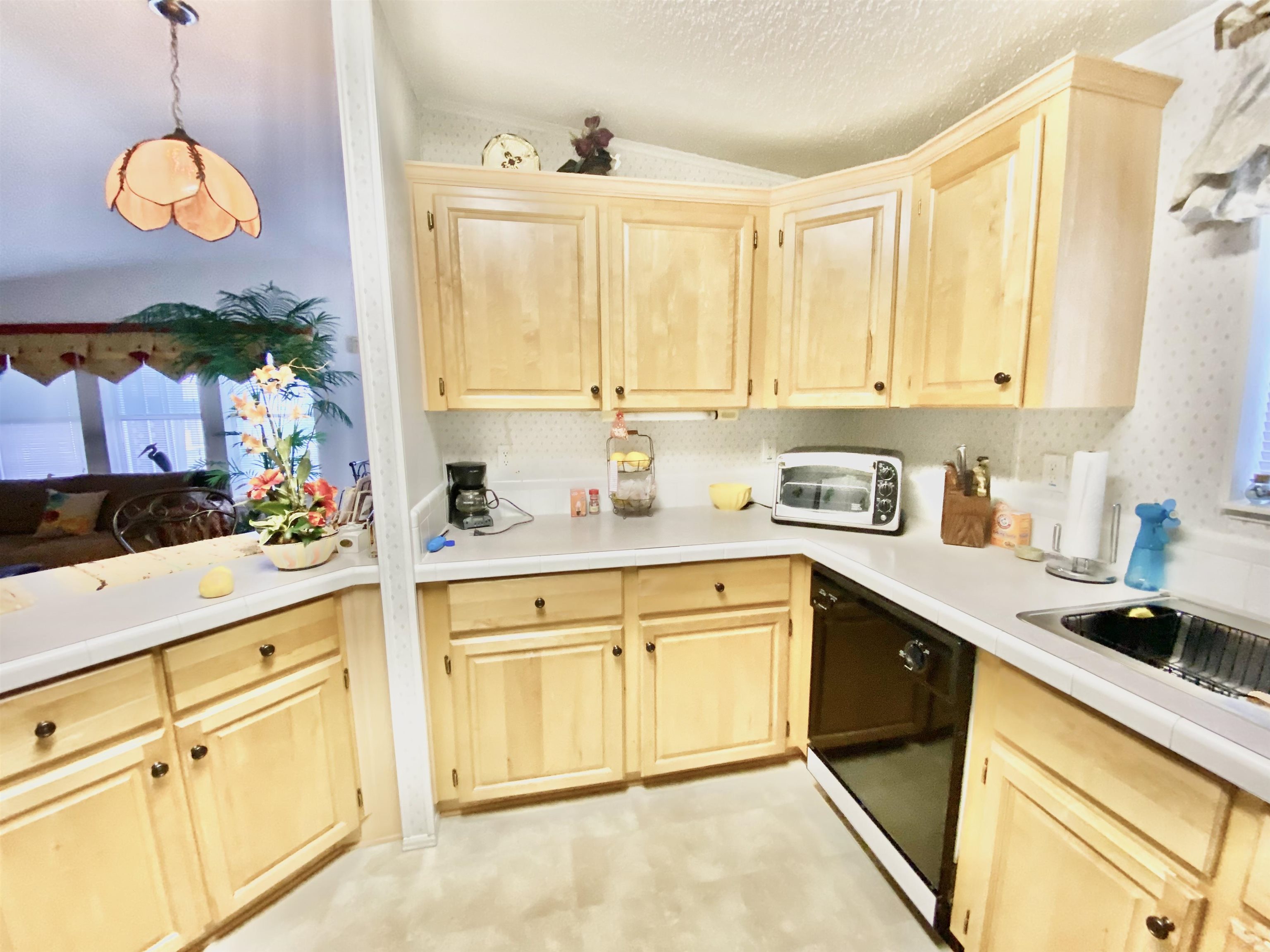 119 Anchorage Drive Beverly Beach, FL 32136 - Photo 7 of 33 a kitchen with cabinets and window
