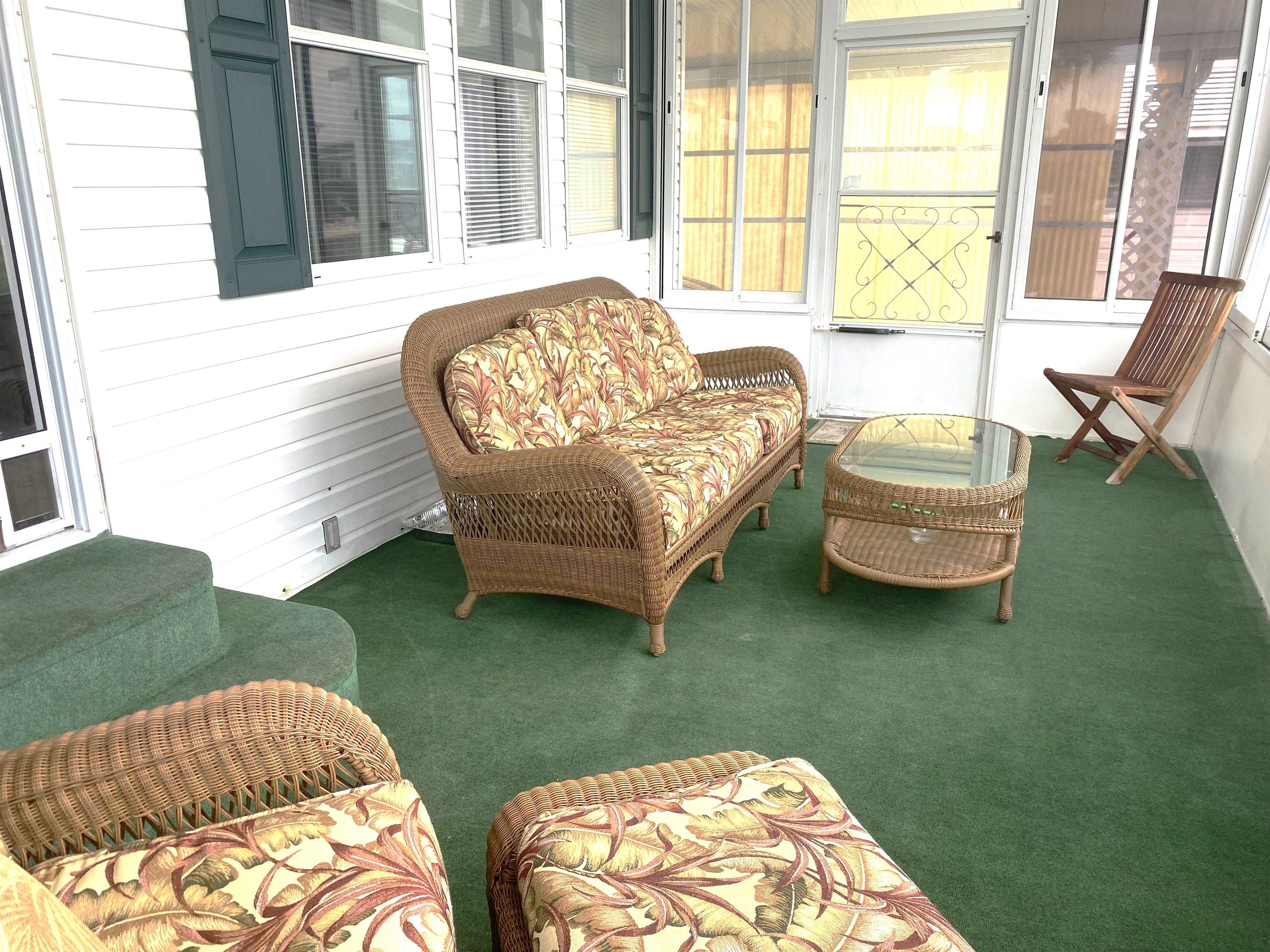 119 Anchorage Drive Beverly Beach, FL 32136 - Photo 10 of 33 a living room with chairs and a table