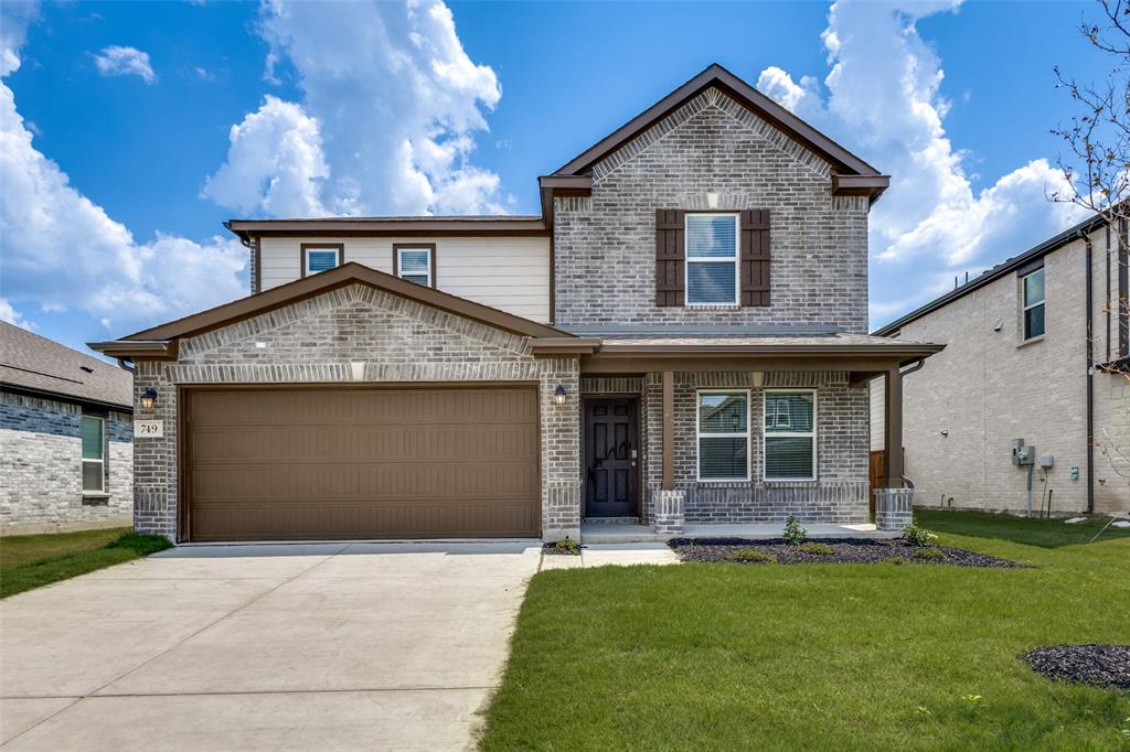 749 Windsor Drive Princeton, TX 75407 - Photo 1 of 1 a front view of a house with a yard and garage