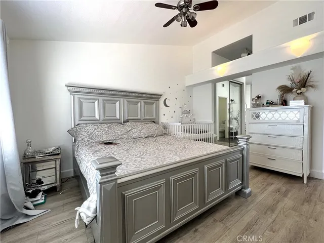 a kitchen with a sink a stove and cabinets