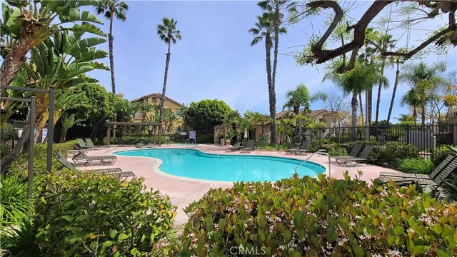 a view of a swimming pool with a garden
