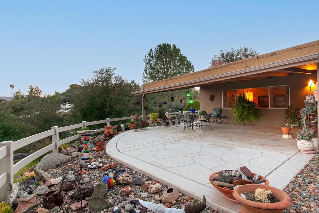2686 Via Viejas Alpine, CA 91901 - Photo 29 of 64 a view of a patio with couches table and chairs and potted plants