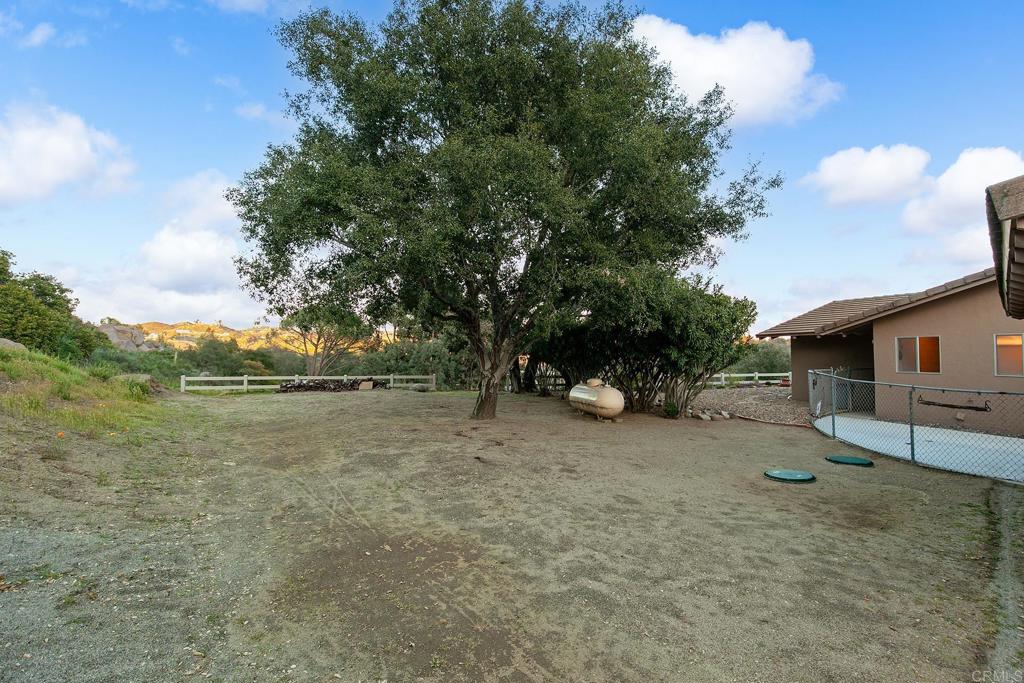 2686 Via Viejas Alpine, CA 91901 - Photo 32 of 64 a backyard of a house with lots of green space