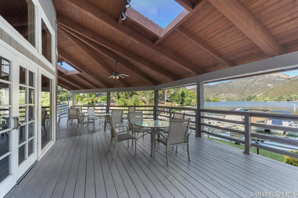 2686 Via Viejas Alpine, CA 91901 - Photo 62 of 64 a view of a patio with table and chairs and wooden floor